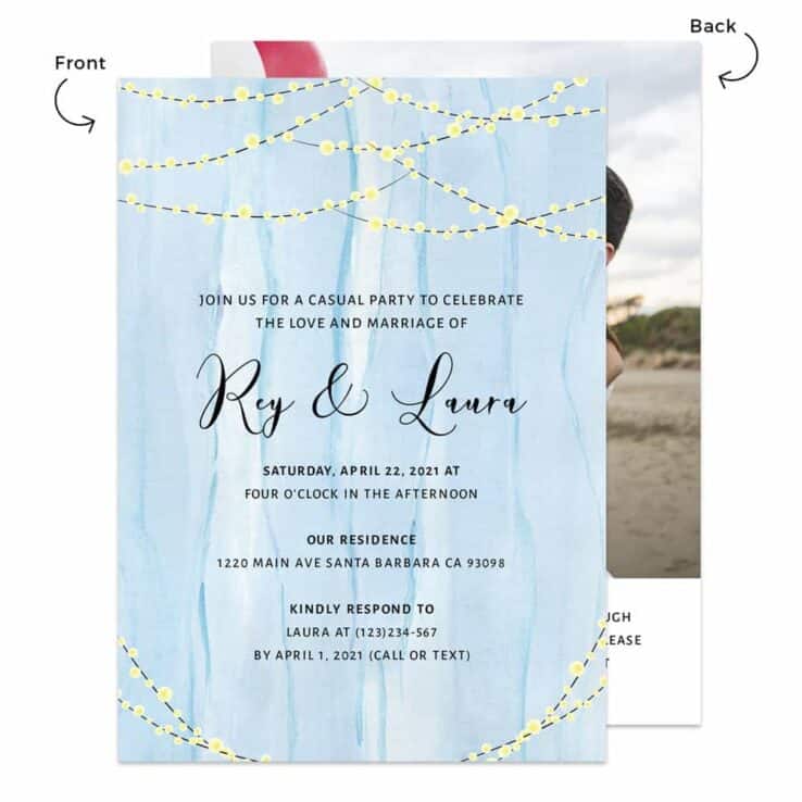 Rustic wedding reception invitation cards, string lights and blue wooden background, elopement450